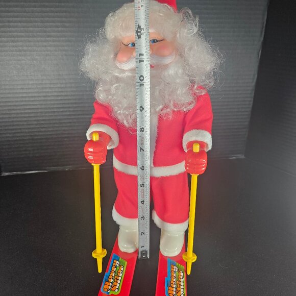 Vintage Musical Merry Skier Santa Claus On Skis Rolls Around & Plays Jingle Bell - Picture 7 of 10